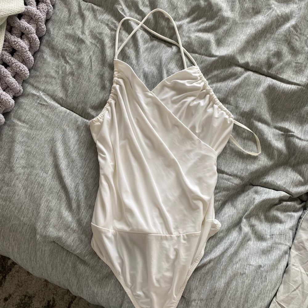 Two saints body suit